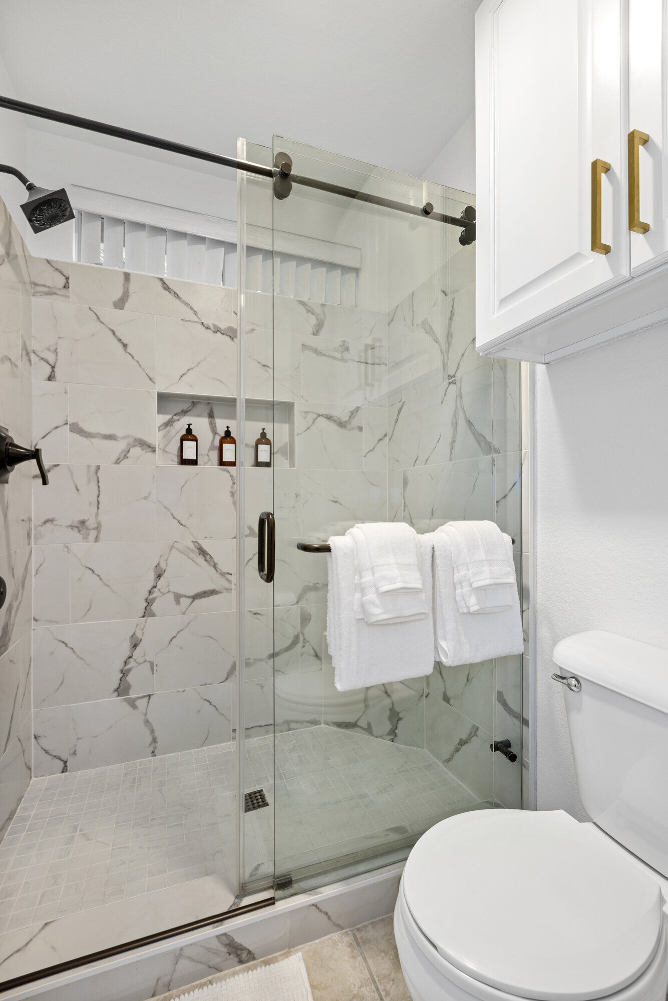 Evening view of pool and outdoor living space